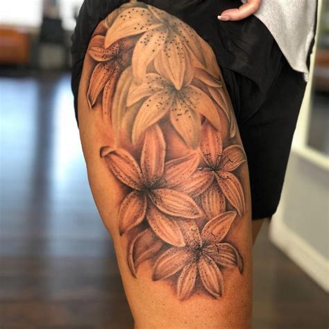 female thigh tattoos|highly feminine thigh tattoos.